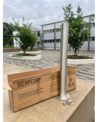 Bollard stainless steel Ø 89 mm stationary with base plate, to be fixed by plugs, without lock, total height approx. 900 mm above ground . Buy in the online store.